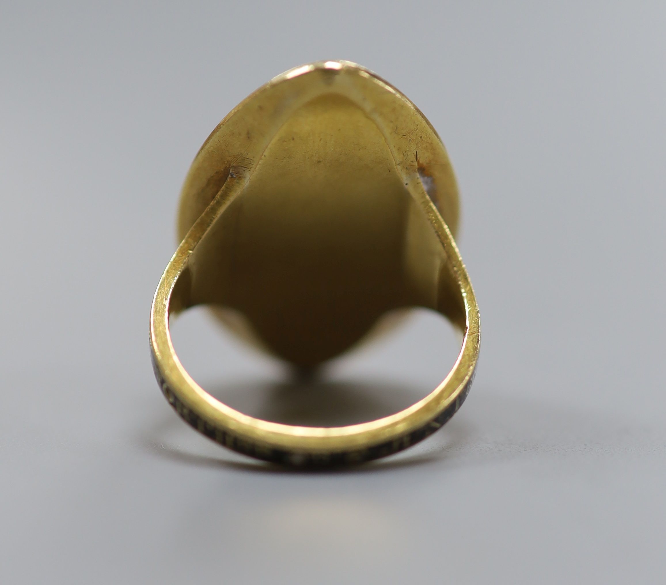 A George III yellow metal and three colour enamel navette shaped mourning ring, with Ducal coronet above 'N' on a pedestal with urn above, the shank with black enamel inscription which reads 'HU. DUX NORTHbr. OB 6 Jun. 1
